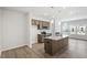 Contemporary kitchen featuring an island, stainless steel appliances, and open layout at 256 Chesapeake Commons St # 157, Garner, NC 27529