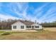 Traditional single-story home with a manicured lawn, landscaping, and inviting entrance at 2650 Spring Hill Rd, Spring Hope, NC 27882