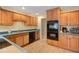 Well-equipped kitchen featuring modern appliances, ample cabinetry, and sleek countertops for cooking at 2650 Spring Hill Rd, Spring Hope, NC 27882