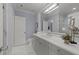 Stylish bathroom with marble floors, dual vanity, and modern fixtures at 2710 Cambridge Rd, Raleigh, NC 27608