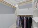 Spacious walk-in closet with custom shelving, hanging rods, and ample storage space at 2710 Cambridge Rd, Raleigh, NC 27608