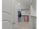 Bright walk-in closet with custom shelving, a carpeted floor and hanging storage at 2710 Cambridge Rd, Raleigh, NC 27608