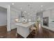 Gourmet kitchen featuring a spacious island, custom cabinets, and designer pendant lights at 2710 Cambridge Rd, Raleigh, NC 27608