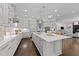 Open kitchen with island, abundant cabinets, and stainless appliances, great for entertaining at 2710 Cambridge Rd, Raleigh, NC 27608