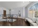 Bright landing area with hardwood floors, large windows, and comfortable bench seating at 2710 Cambridge Rd, Raleigh, NC 27608
