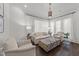 Bright living room with stylish furnishings, hardwood floors, and sheer window coverings at 2710 Cambridge Rd, Raleigh, NC 27608