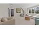 Bright living room with neutral tones, comfortable seating, and a large window at 2710 Cambridge Rd, Raleigh, NC 27608
