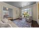 Comfortable living area with large window, stylish furnishings, and inviting atmosphere at 2710 Cambridge Rd, Raleigh, NC 27608