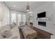 Stylish living room featuring modern fireplace, comfortable seating, and elegant decor at 2710 Cambridge Rd, Raleigh, NC 27608