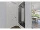 Dedicated wine room with glass door and ample storage, adjacent to the dining area at 2710 Cambridge Rd, Raleigh, NC 27608