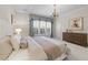 Airy bedroom showcasing a designer window and plenty of natural light at 2820 Glenwood Gardens Ln # 101, Raleigh, NC 27608