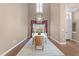 Bright dining room boasts high ceilings, an elegant light fixture, and large windows at 2820 Glenwood Gardens Ln # 101, Raleigh, NC 27608