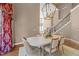 Spacious dining area with a large table, decorative rug, and elegant decor at 2820 Glenwood Gardens Ln # 101, Raleigh, NC 27608