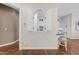 Interior shot showcasing the arched pass-through window connecting the living area and kitchen at 2820 Glenwood Gardens Ln # 101, Raleigh, NC 27608