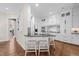 Bright kitchen with white cabinetry, granite countertops, and stainless steel appliances at 2820 Glenwood Gardens Ln # 101, Raleigh, NC 27608