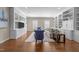 Comfortable living room boasts hardwood floors, built-in storage, and modern decor at 2820 Glenwood Gardens Ln # 101, Raleigh, NC 27608