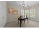 Well lit office features shuttered windows and hanging chandeliers at 2820 Glenwood Gardens Ln # 101, Raleigh, NC 27608
