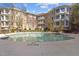 Upscale condo buildings surround a stunning outdoor pool and lounge area at 2820 Glenwood Gardens Ln # 101, Raleigh, NC 27608