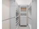 Efficient walk-in closet with multiple shelves, drawers and hanging space at 2820 Glenwood Gardens Ln # 101, Raleigh, NC 27608