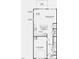 Open-concept first-floor layout featuring a kitchen, dining area, gathering room, and one-car garage at 284 Hank Way, Angier, NC 27501