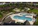 Beautiful aerial view of community pool, playground, and surrounding single-Gathering homes at 3012 Dog Rose Dr # 305, Durham, NC 27703
