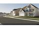 Charming neighborhood showcasing a variety of home exteriors and manicured lawns at 3012 Dog Rose Dr # 305, Durham, NC 27703
