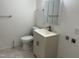 Bright bathroom featuring a vanity, toilet, and modern fixtures at 3132 Fields Dr, Raleigh, NC 27603