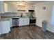 Modern kitchen with stainless steel appliances, white cabinets, and granite countertops at 3132 Fields Dr, Raleigh, NC 27603