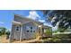 A rear view of a lovely home featuring a covered porch and well-maintained siding at 33 White Azalea Way, Homesite 80, Benson, NC 27504