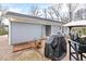 Backyard with patio, BBQ grill and a fire pit at 3650 Durwood Ln, Raleigh, NC 27604