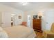 Bedroom boasting access to the ensuite bath and great lighting at 3650 Durwood Ln, Raleigh, NC 27604