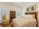 Bedroom with hardwood floors and neutral decor features, enhancing a tranquil atmosphere at 3650 Durwood Ln, Raleigh, NC 27604