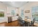 Bright kitchen with stainless appliances, granite counters, and a door to outside at 3650 Durwood Ln, Raleigh, NC 27604