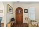 Charming wood door, hardwood floors, and arched doorways at 3650 Durwood Ln, Raleigh, NC 27604