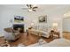 Comfortable living room with a fireplace and stylish decor at 3650 Durwood Ln, Raleigh, NC 27604
