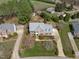 Aerial view of home featuring lush landscaping and circular driveway at 3708 Wesley Ridge Dr, Apex, NC 27539