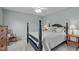 Comfortable bedroom with a four-poster bed, ceiling fan, and neutral walls for a relaxing atmosphere at 3708 Wesley Ridge Dr, Apex, NC 27539
