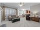 Open floor plan with bay windows and view to kitchen at 3708 Wesley Ridge Dr, Apex, NC 27539