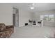 Upstairs living area offers comfortable seating, natural light, and plenty of space for recreation and relaxation at 3708 Wesley Ridge Dr, Apex, NC 27539