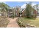 Charming two-story brick home featuring a welcoming front porch and a beautifully landscaped yard at 3715 Rawls Church Rd, Fuquay Varina, NC 27526