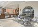 Covered patio with outdoor seating and built-in grill, perfect for entertaining at 3715 Rawls Church Rd, Fuquay Varina, NC 27526