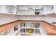 Walk-in pantry with custom wood countertops and built-in shelving for optimal organization at 3901 Laurel Creek Ln, Wake Forest, NC 27587