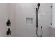 Shower features white subway tile, matte black fixtures, and a tiled shampoo niche at 3901 Laurel Creek Ln, Wake Forest, NC 27587