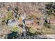 Aerial view showcasing the home, its yard, and surrounding neighborhood at 4508 Regis Ave, Durham, NC 27705