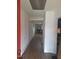 Hallway with laminate flooring and white walls at 614 Oak St, Burlington, NC 27215