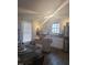 Bright kitchen with stainless steel appliances and tile backsplash at 614 Oak St, Burlington, NC 27215