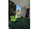 Balcony with artificial grass and green Adirondack chairs at 618 N Boylan Avenue # 300, Raleigh, NC 27603