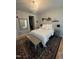 Comfortable bedroom with a chandelier, decorative accents, and neutral colors at 618 N Boylan Avenue # 300, Raleigh, NC 27603