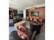 Relax in the community room with comfortable chairs, a large screen tv, and game tables at 618 N Boylan Avenue # 300, Raleigh, NC 27603