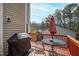 Relax on this wooden deck with outdoor furniture and trees at 6221 Tributary Dr, Raleigh, NC 27609